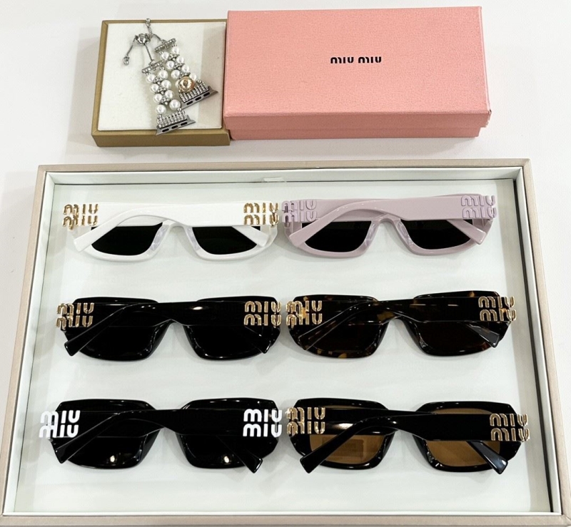 Miu miu Sunglasses